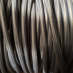 Câble fil électrique tissu rond gris.